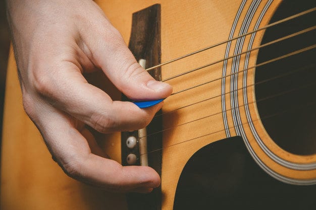 strumming guitar strumming guitar learning to play guitar